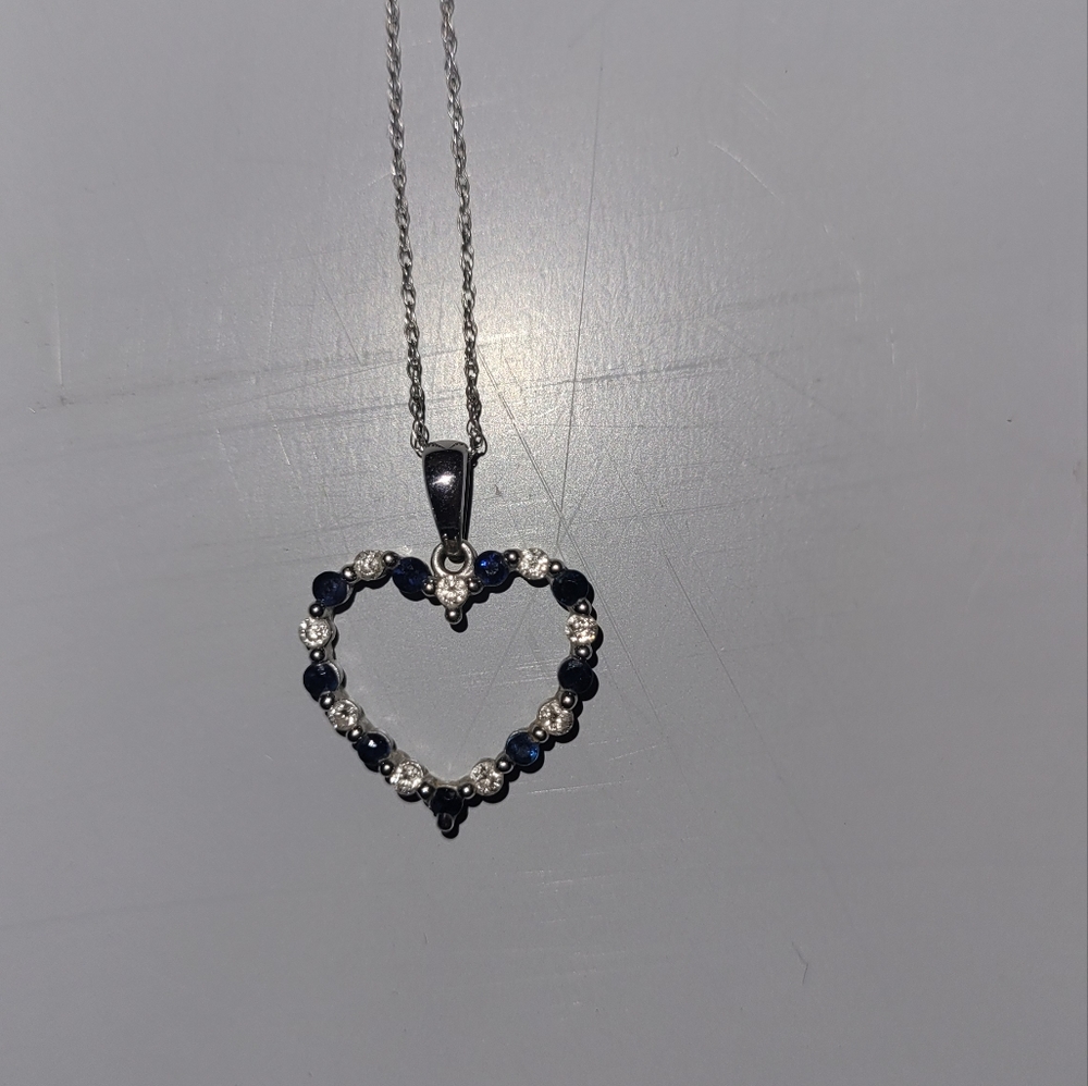 White gold diamond and sapphire heart necklace from zales.